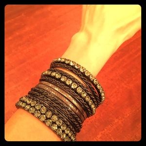 Super fun stack of silvery and rhinestone bangles