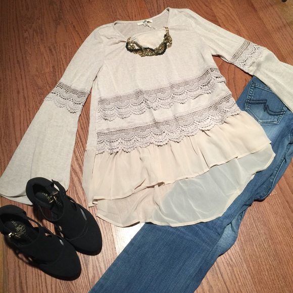 Bell sleeves with patches.  Lace trim