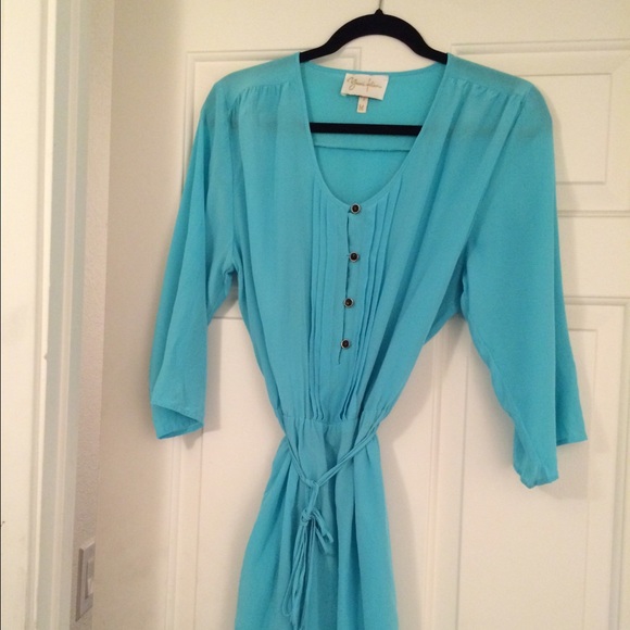 Silk blue dress with tassel tie belt