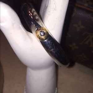 Henry Bendel bangle SIGLER and gold emblem
