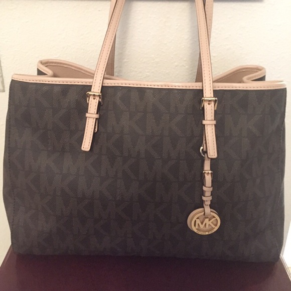 SOLD MICHAEL KORS SIGNATURE PVC TRAVEL TOTE SOLD