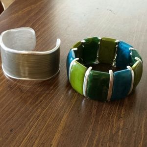 2 bracelets one is lia Sophia