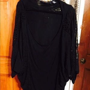 Black top with sheer sleeves