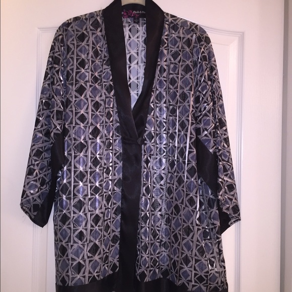 Sheer elegant topper.  Greys and black.