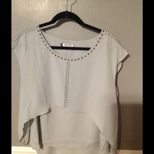 Jennifer Lopez baby blue high low shirt