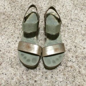 OTBT gold size 7.5. Fits a regular size 8.