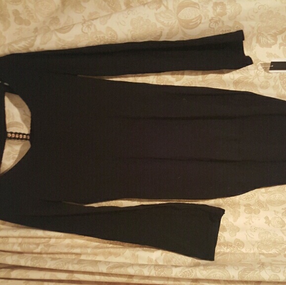 Black sweater tunic with gold studded caged back