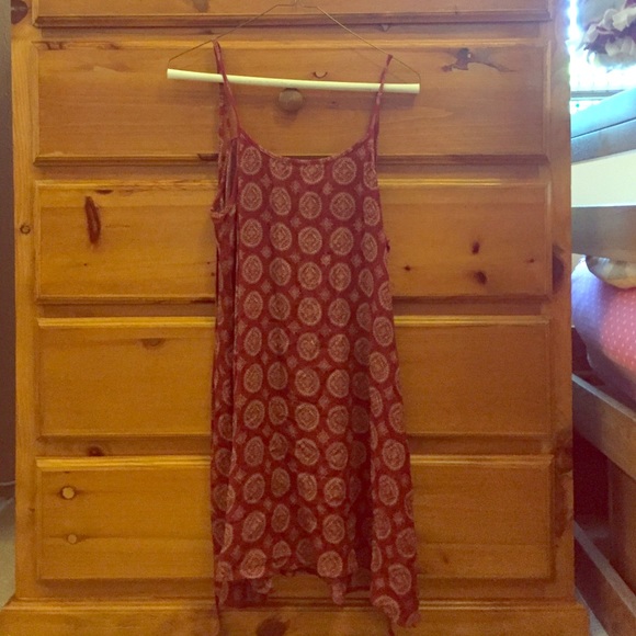 Red summer dress with a low back & pretty designs