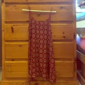Red summer dress with a low back & pretty designs