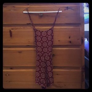 Red short romper with designs & cross cross back