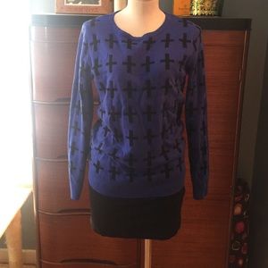 Black and blue cross sweater