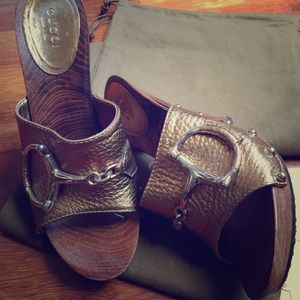 Gucci horsebit clogs in a bronze/gold