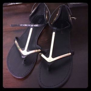 Zigi gold arrow black strappy sandals