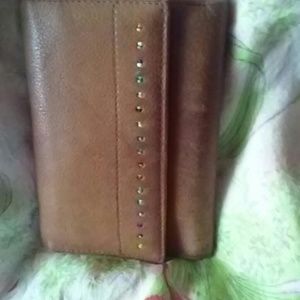 card wallet of soft leather and embroidered petals