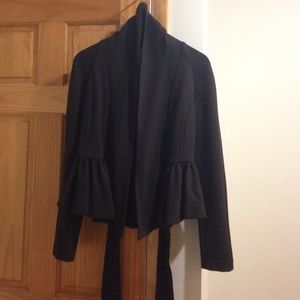 The cutest chocolate brown peplum blazer!! The cutest chocolate brown peplum blazer!!
