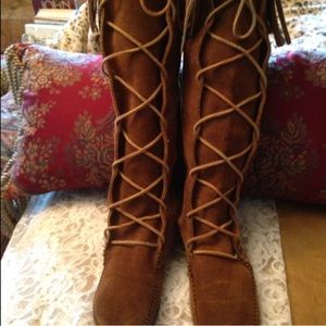 Lace up fringe Minnetonka moccasin boots