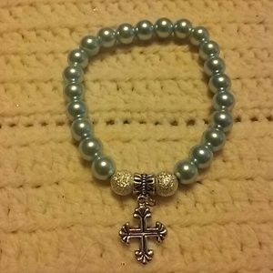 Blue pearl stretch bracelet with silver cross char