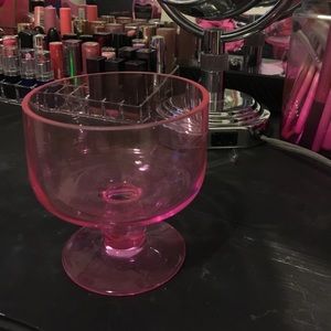Pink glass organizer.