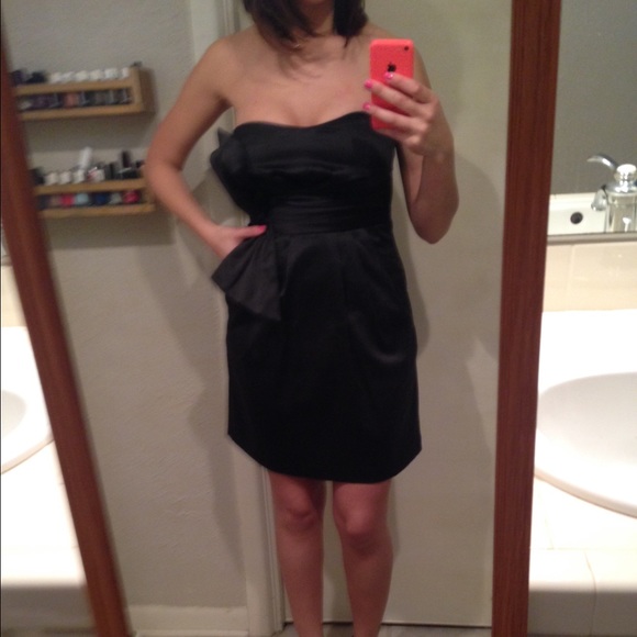 Strapless black dress with pockets
