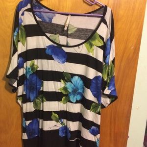 Black and white striped shirt with blue flowers