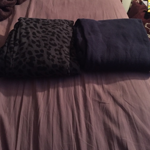 Black zebra pajama pants and navy blue sweatpants