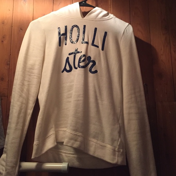 Hollister white sweatshirt with blue lettering.