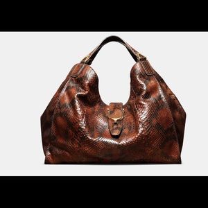 Gucci snake skin purse, perfect condition.