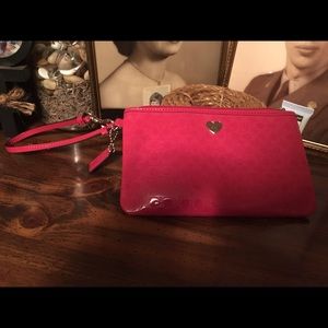 Coach large pink Wristlet