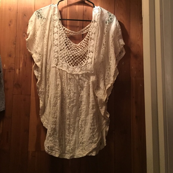 Flower shirt see-through. Very cute and dressy