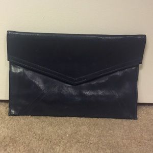 Navy blue envelope clutch w/ screw print interior