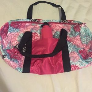 New gym bag with pink water bottle