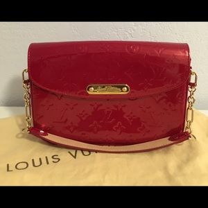 LOUIS VUITTON
Monogram Vernis Rodeo Drive Clutch