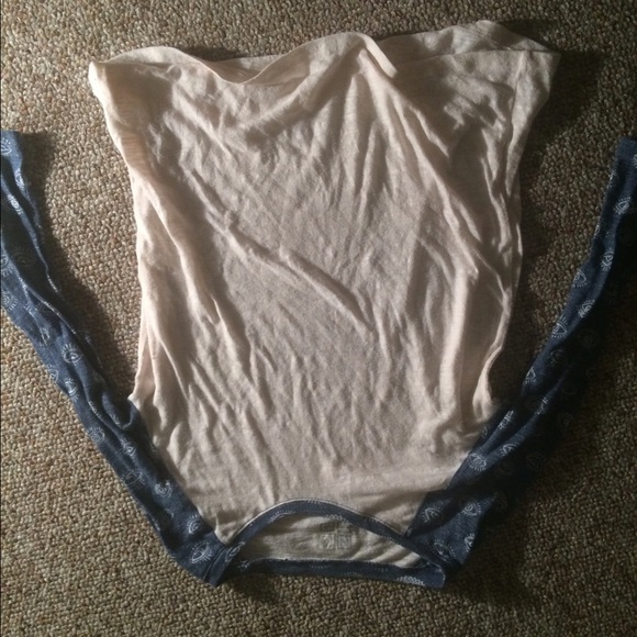 cream short with blue eye detailing - Picture 1 of 1