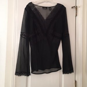 Sheer black blouse with lace detailing