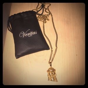 Gold Jesus piece by Veritas