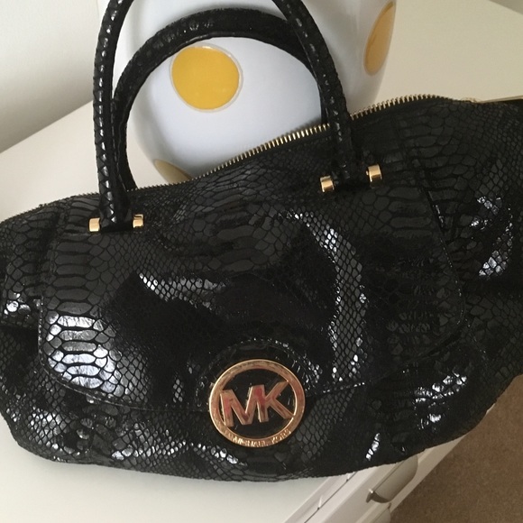 $100 - Picture 1 of 4