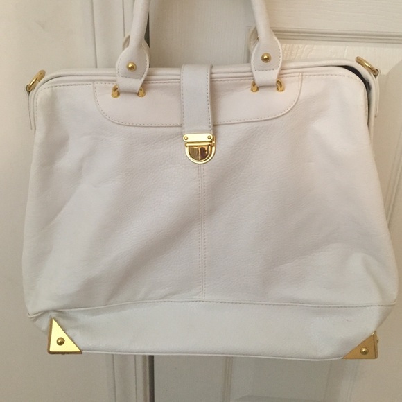 White with gold detailing Justfab tote!
