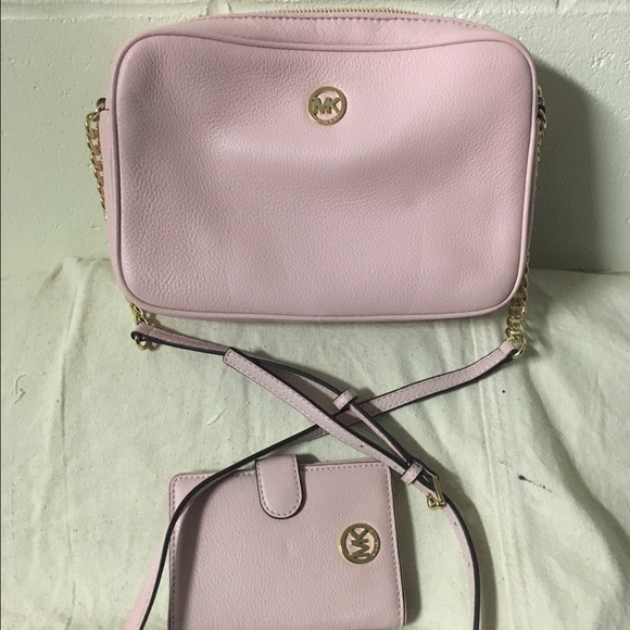 light pink cross body bag with matching wallet