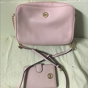 light pink cross body bag with matching wallet