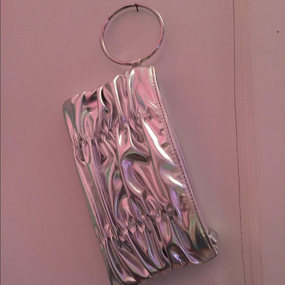 Light weight silver clutch never used NEGOTIABLE!!