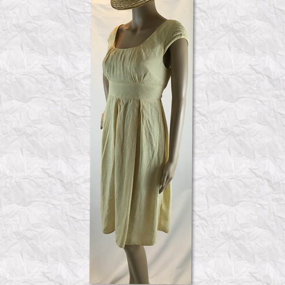 Polka dot pleated dress