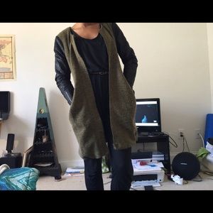 olive green faux leather sleeved winter coat.