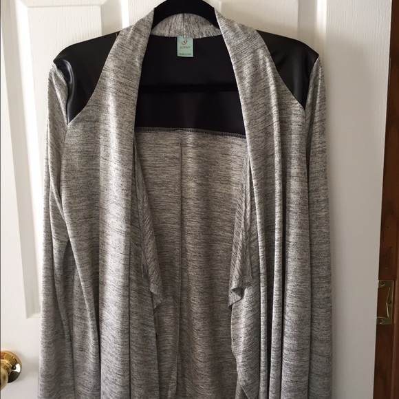 On trend, grey jacket with faux leather.