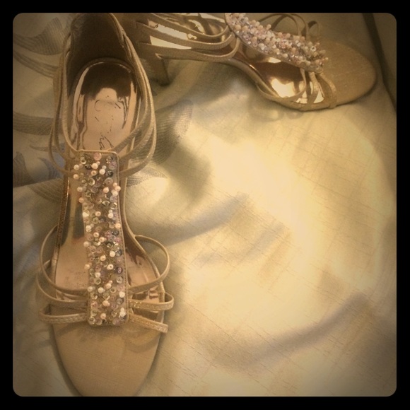 Metaphor pearly colored sandals