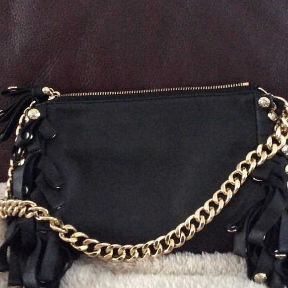 Henri bendel clutch with fringe