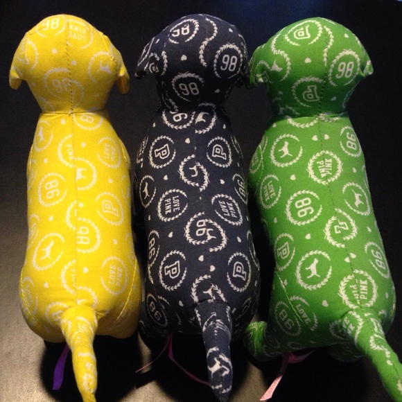 Three pink 86 dogs