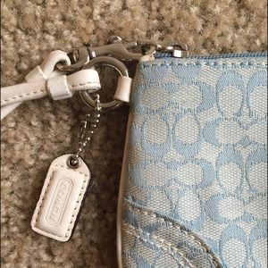 Sky blue Coach wristlet