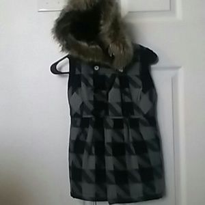 Vest with fluffy hood.