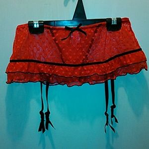 Slip with attached thong and garters