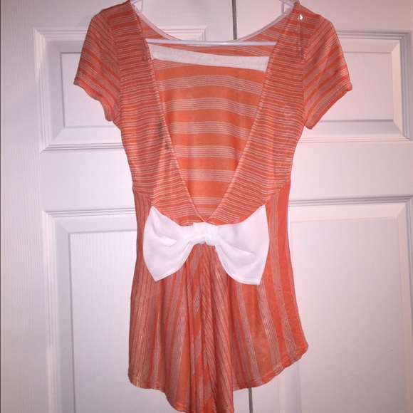 Orange top with bow